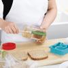 imageTovolo FlexCore LongHandled Silicone Jar Scraper Spatula Wood Handle HeatResistant Silicone Head With Curved Front for Scooping ampamp Scraping DishwasherSafe ampamp BPAFreePesto